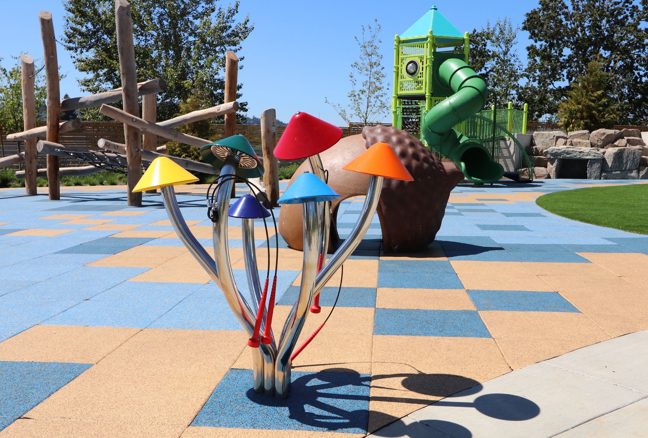 Concord Park playground with musical instruments and climbing structures