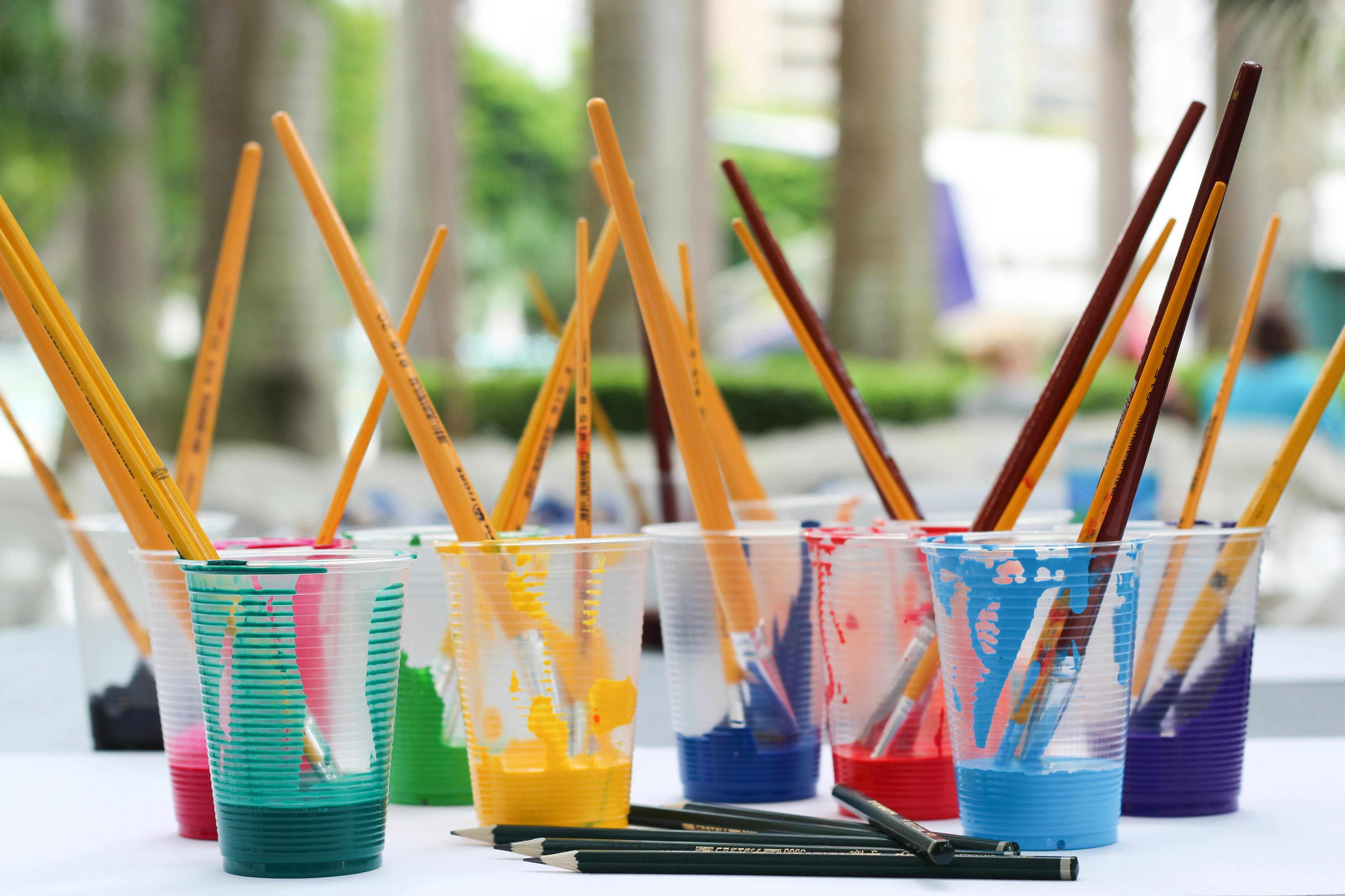 Art paint brushes in cups